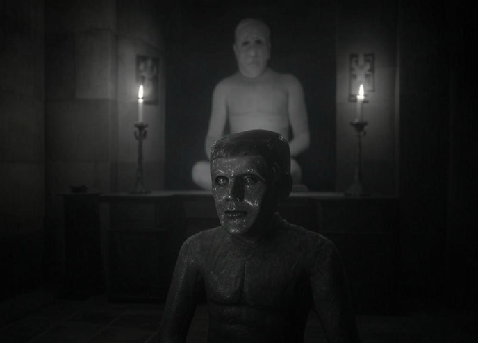 Statue dim room candles meditation