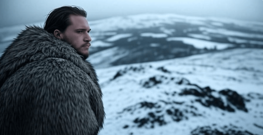 A rugged figure in a thick fur cloak standing on a snowy mountain ridge, overlooking a vast winter landscape.