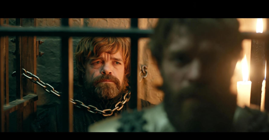 Jaime Lannister freeing Tyrion from his dungeon cell, symbolizing loyalty and betrayal in Game of Thrones.